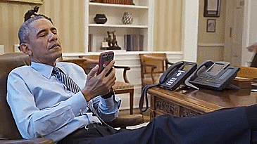 Michelle grabs Obama phone GIF