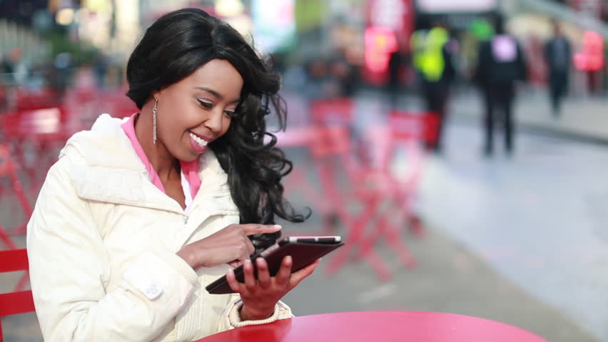 excited woman on phone