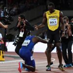 Justin Gatlin bows for Usain Bolt