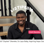 Chidi Okereke smiling on a staircase, featured in Listipedia by Lists.ng.